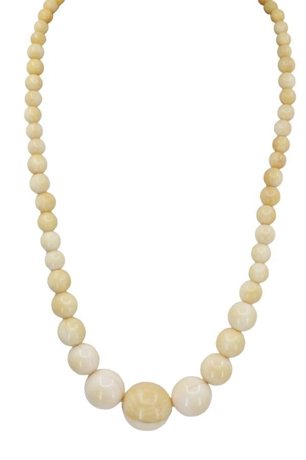 COLLIER IVOIRE EN CHUTE — vue 1