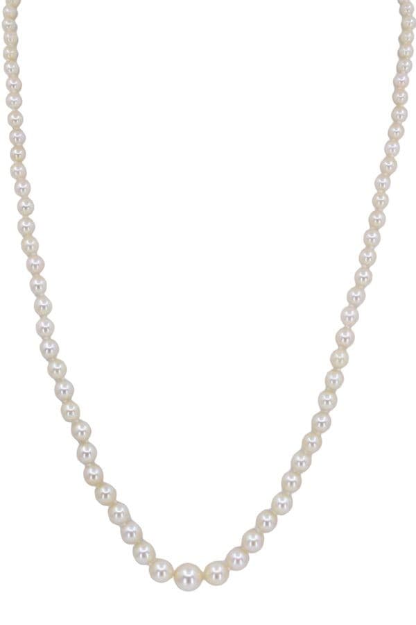 COLLIER DE PERLES EN CHUTE ET RUBIS — vue 1