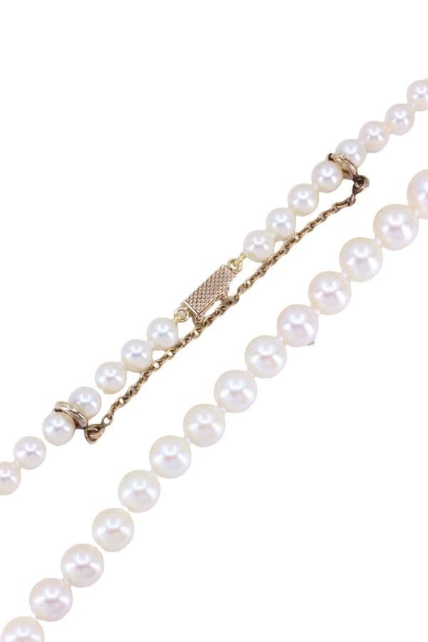 COLLIER DE PERLES EN CHUTE — vue 3