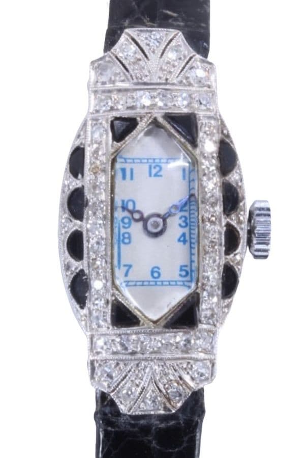 MONTRE ART-DÉCO ONYX ET DIAMANTS — vue 1