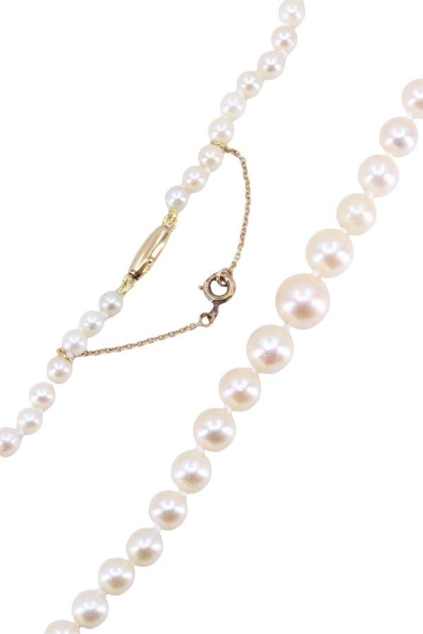 COLLIER DE PERLES EN CHUTE — vue 3