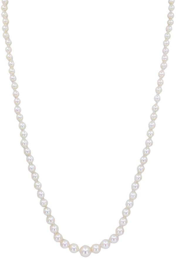 COLLIER DE PERLES EN CHUTE — vue 1