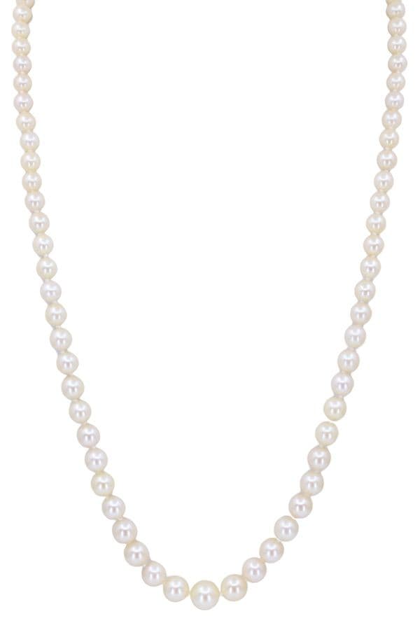 COLLIER DE PERLES EN CHUTE — vue 1