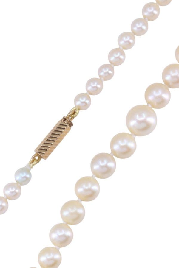 COLLIER DE PERLES EN CHUTE — vue 3