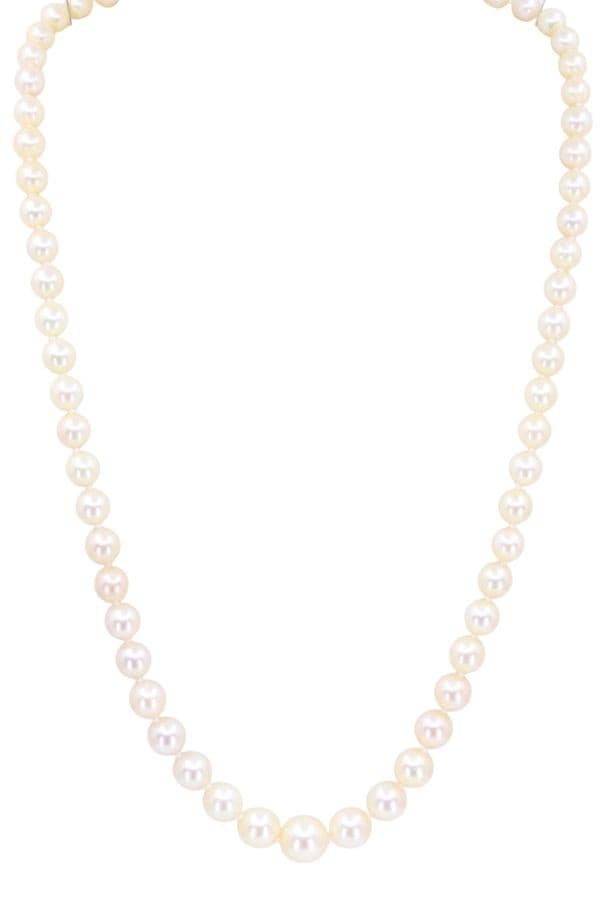 COLLIER DE PERLES EN CHUTE — vue 1
