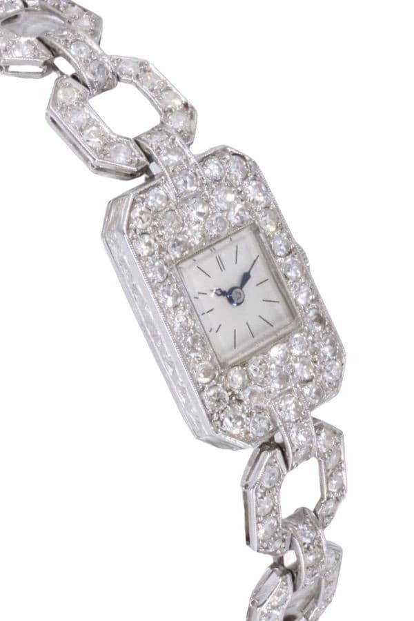 MONTRE ART-DÉCO PLATINE ET DIAMANTS — vue 3