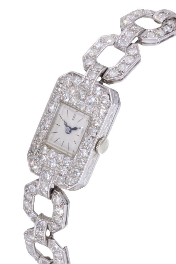 MONTRE ART-DÉCO PLATINE ET DIAMANTS — vue 4
