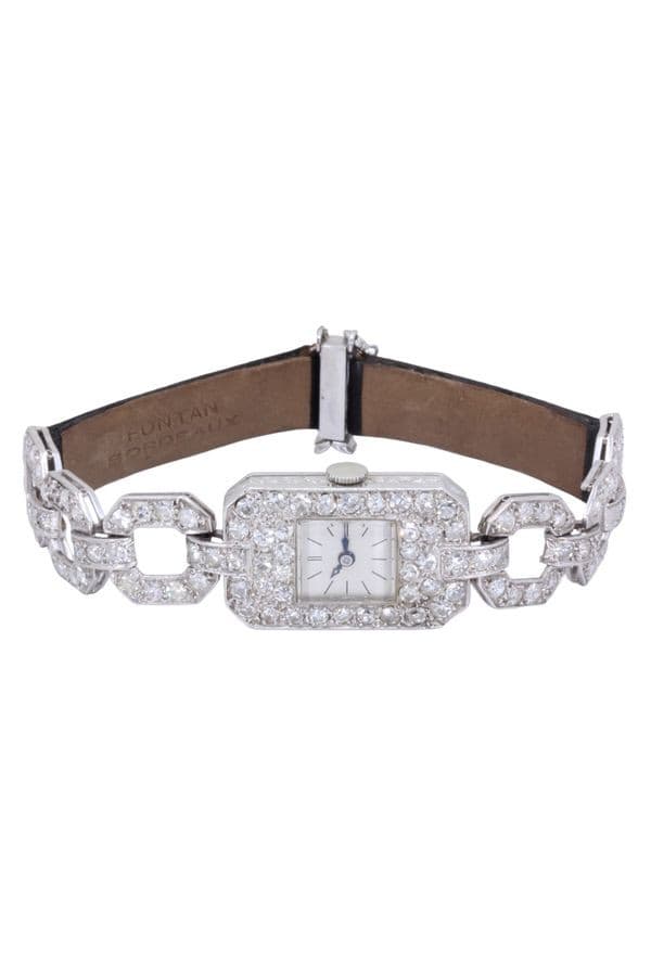 MONTRE ART-DÉCO PLATINE ET DIAMANTS — vue 5