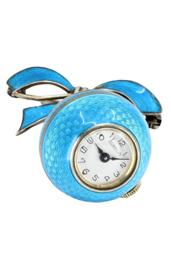 MONTRE/BROCHE GÜBELIN "BOULE DE GENÈVE" — vue 1