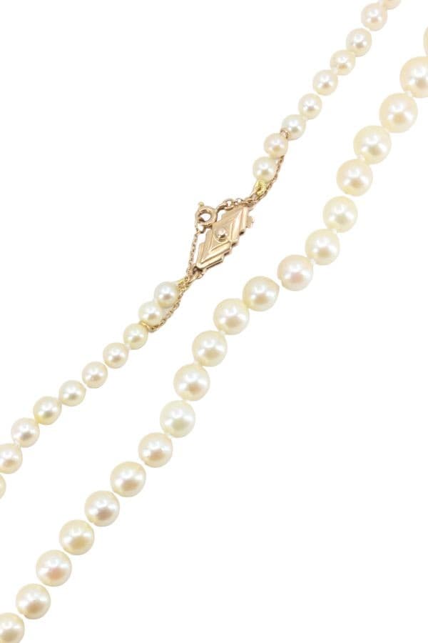 COLLIER DE PERLES EN CHUTE — vue 3
