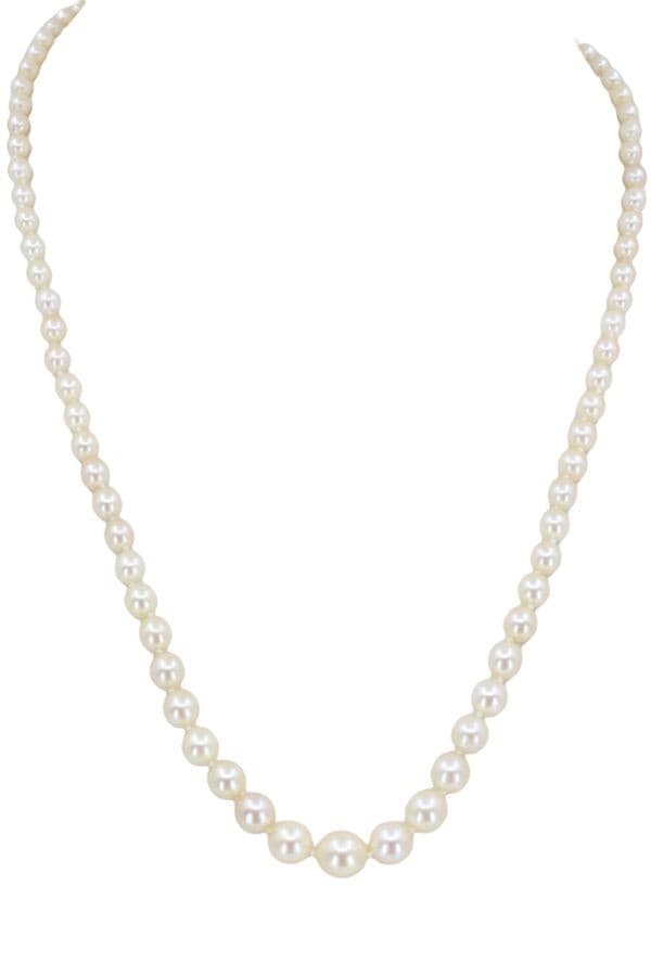 COLLIER DE PERLES EN CHUTE — vue 1