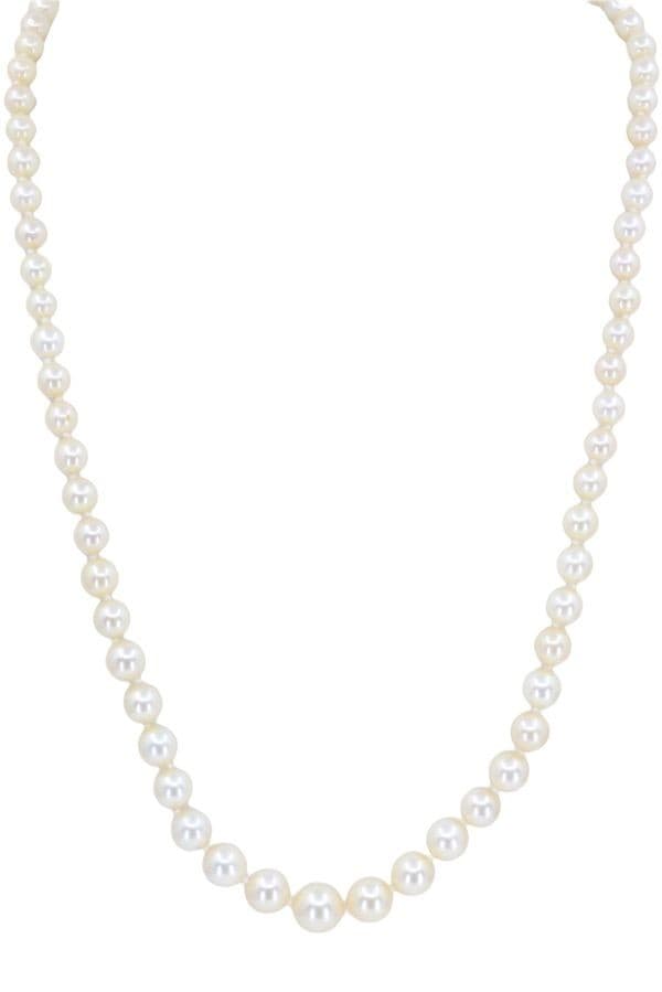 COLLIER DE PERLES EN CHUTE — vue 1