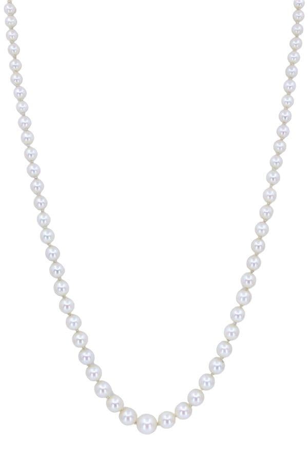 COLLIER DE PERLES EN CHUTE — vue 1