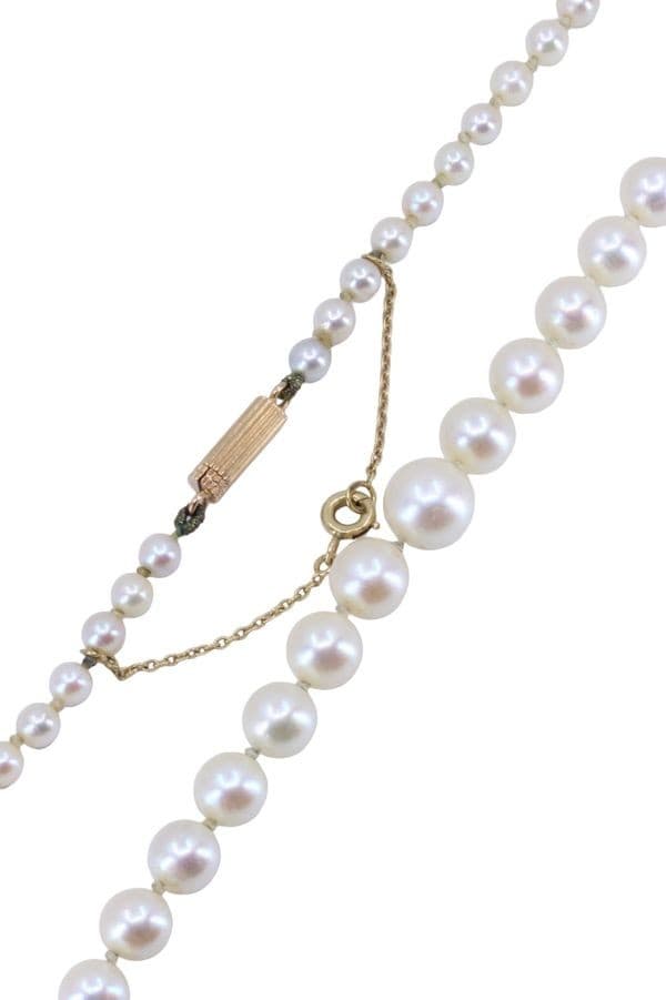 COLLIER DE PERLES EN CHUTE — vue 3
