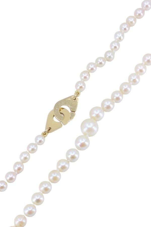 COLLIER DE PERLES EN CHUTE — vue 3