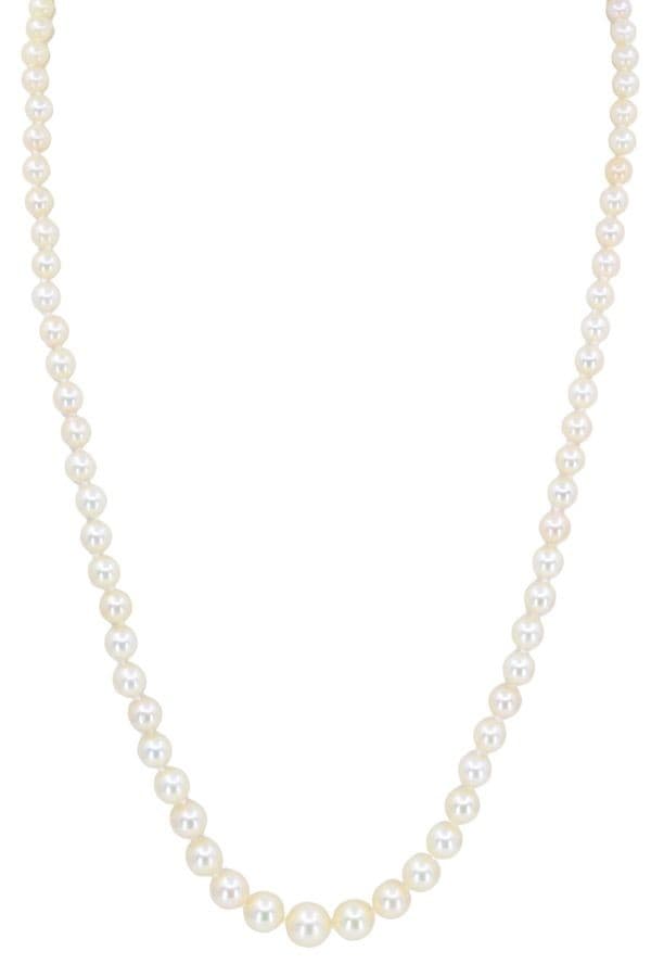 COLLIER DE PERLES EN CHUTE — vue 1