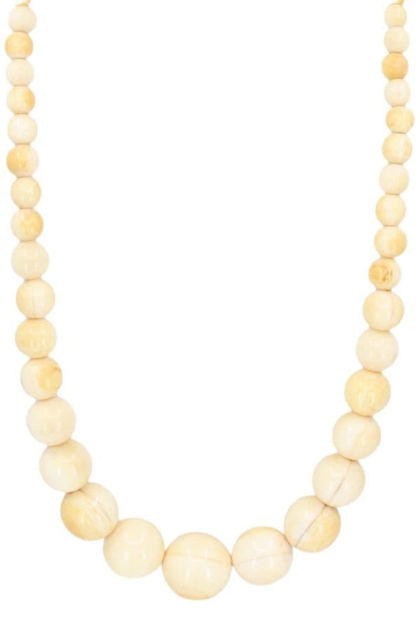 COLLIER IVOIRE EN CHUTE — vue 1